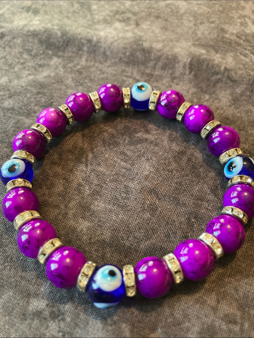 Gorgeous Purple Beaded Bracelet with Blue Evil Eye Accents